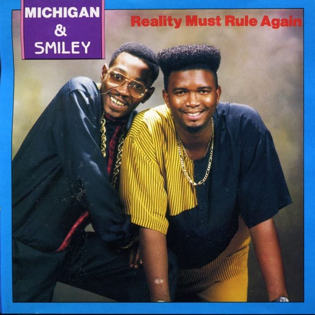 Michigan & Smiley – Reality Must Rule Again 1 capa Michigan